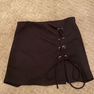 Black lace up skirt with shorts in the back